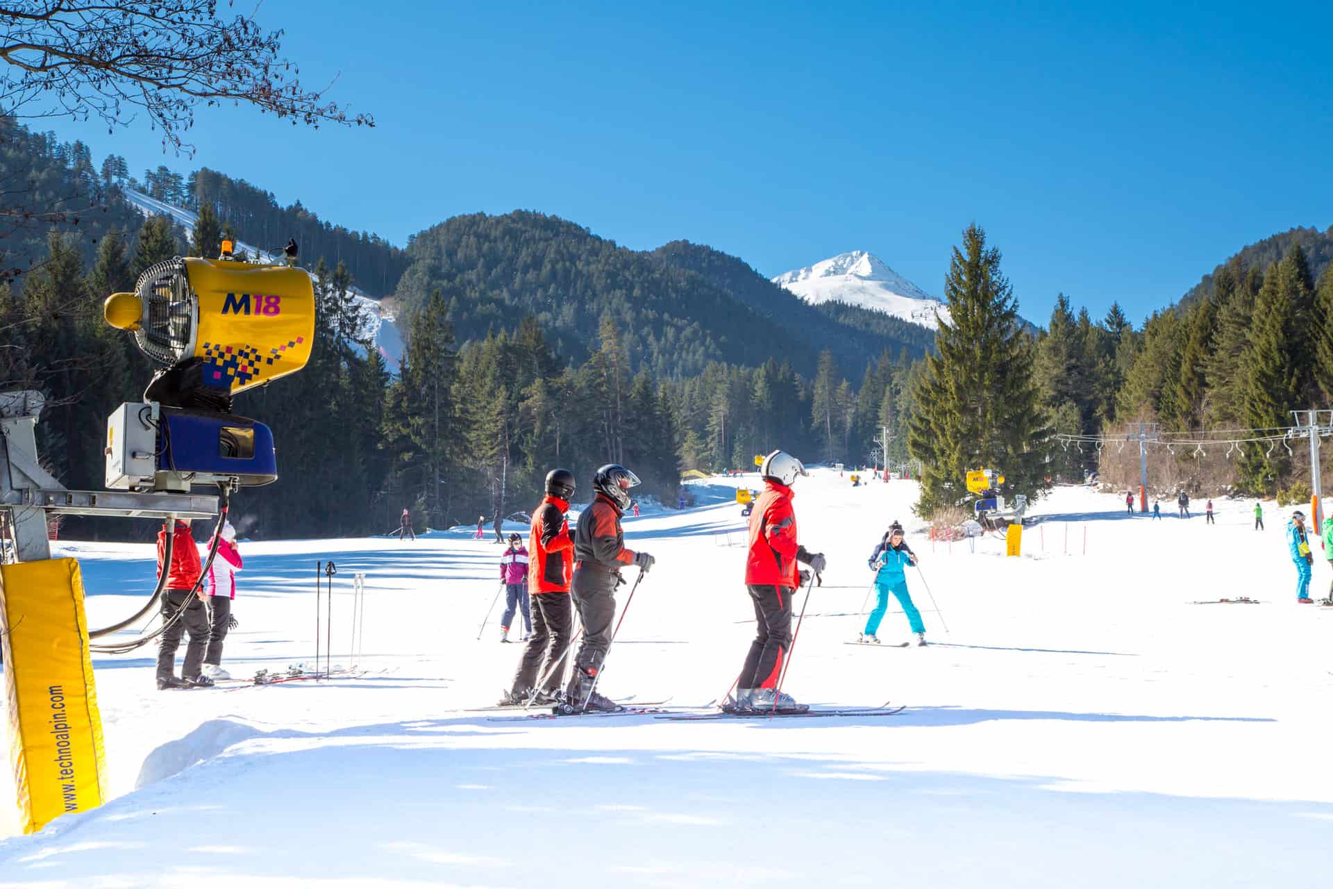 Skiers on the slope in Bansko, Bulgaria